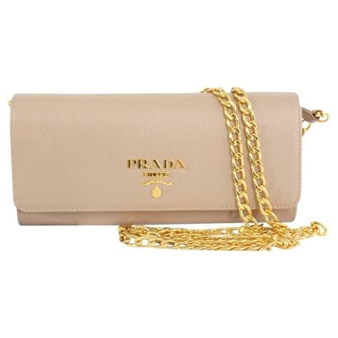 prada clutch for women.